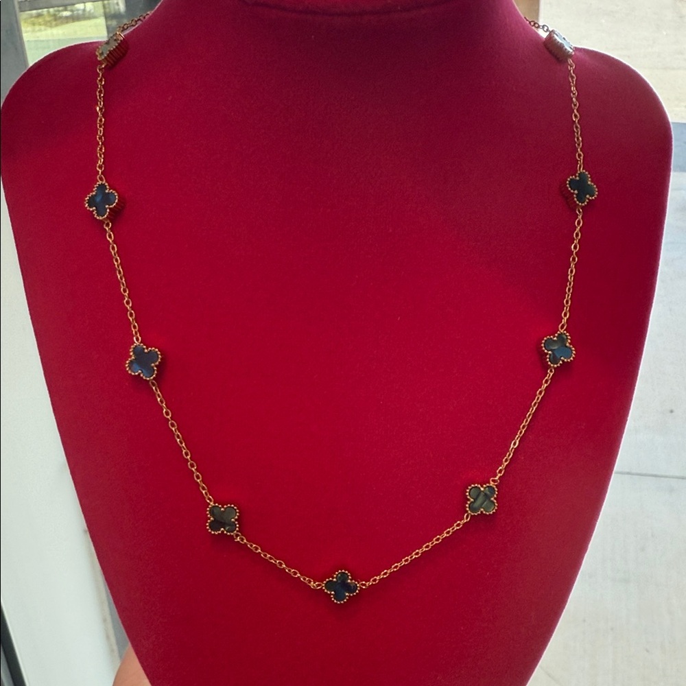 Elegant Gold and Black Clover Necklace